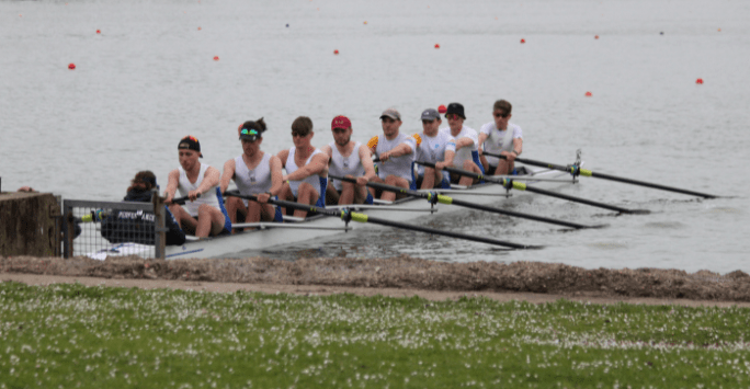 a student rowing team in action