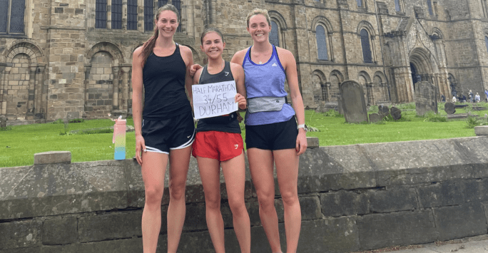 runners in front of cathedral