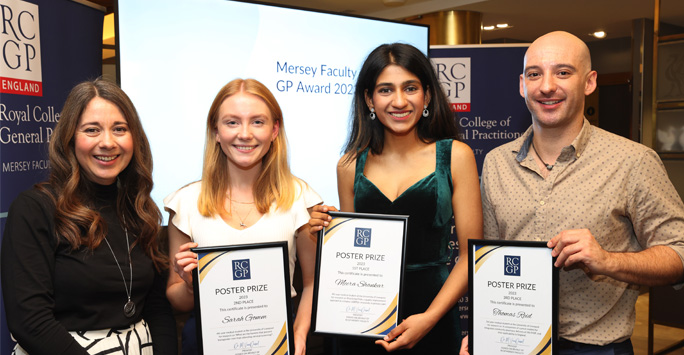 Winners hold RCGP prize certificate
