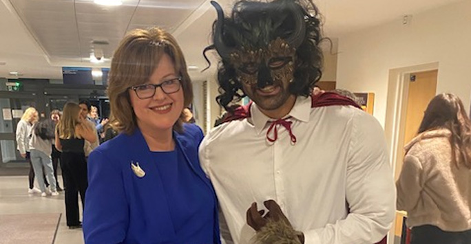 The Dean of the School of Medicine with the Beast character