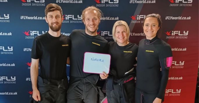 Skydiving team pose for award photo
