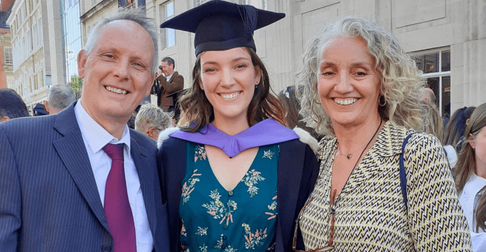 graduate and proud parents