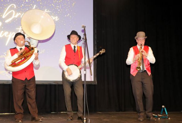 Winter Graduation band playing on stage