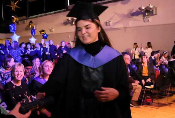 Student receiving a prize at Winter Graduation