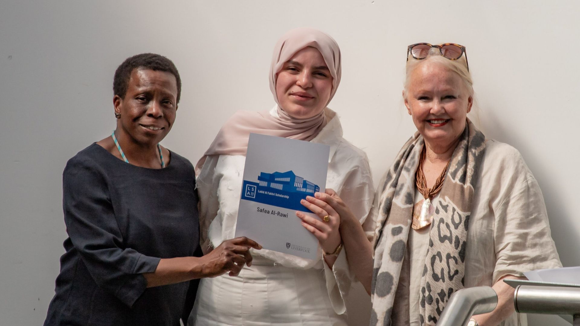 Safea (centre) is pictured with Professor Ola Uduku, Head of the School of Architecture (left), and Patricia Al-Fakhri (right).