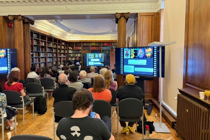 Yannis presenting inaugural lecture to large crowd in the SotA library