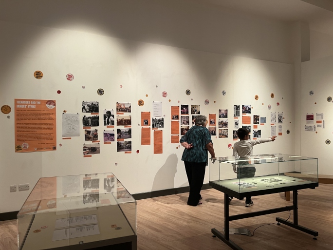 People viewing the Teenagers and the Miners’ Strike Exhibition