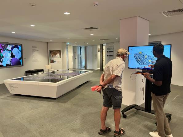 Visitors exploring Harat al-Bilad, Manah virtual exhibition at RIBA North as part of ArCHIAM 10-year celebration events