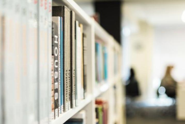 A high contrast image of a shelf at the Harold Cohen Library