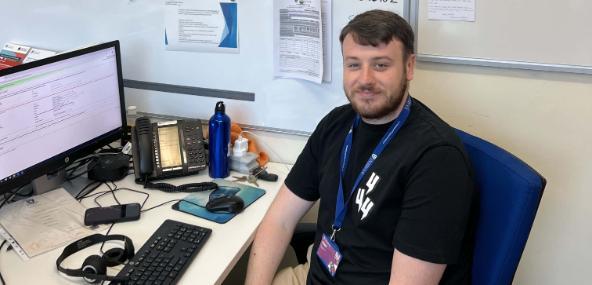 Kane M at desk