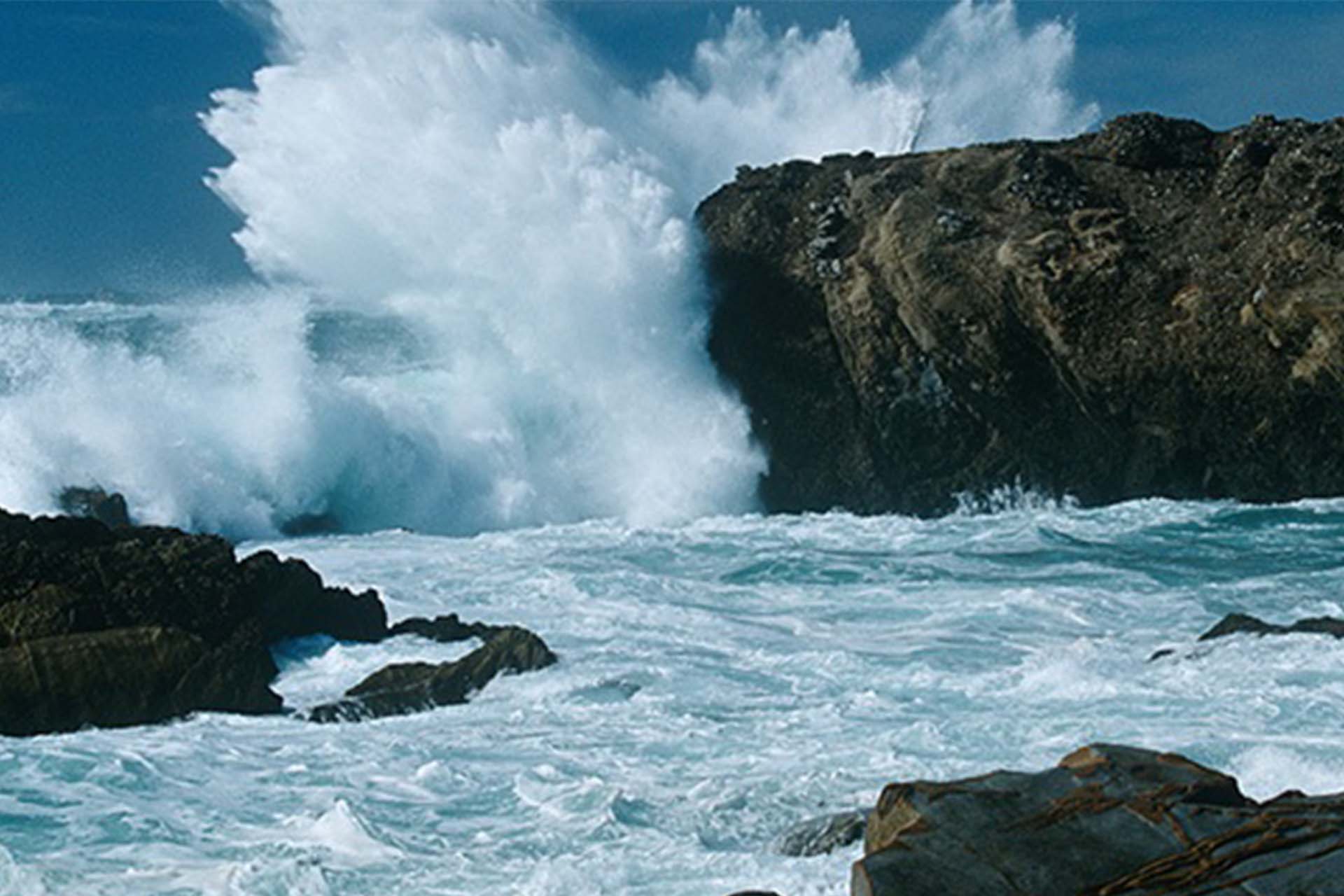 Waves crashing against rocks