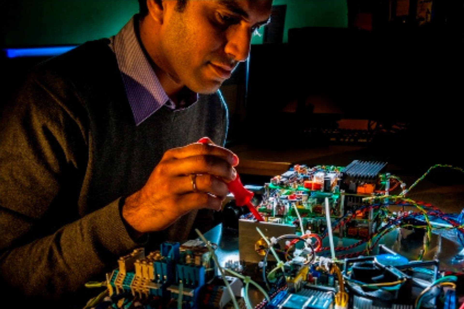 A researcher working on electronic components