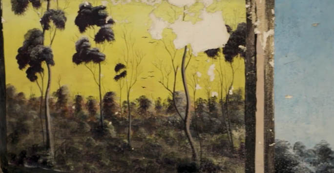 A prisoners' artwork from Fremantle Prison depicting trees on a desert.