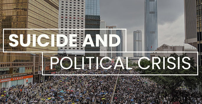 Long Reads - Suicide and Political Crisis - image of Hong Kong protests with white text overlaid that reads 'Suicide and Political Crisis'