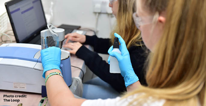 A girl testing drugs in a lab taken by The Loop photographer.