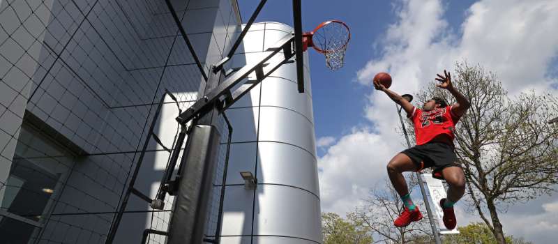 student playing basketball