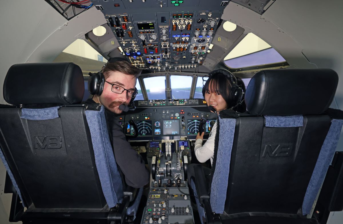 Aerospace Engineering students using the flight simulator