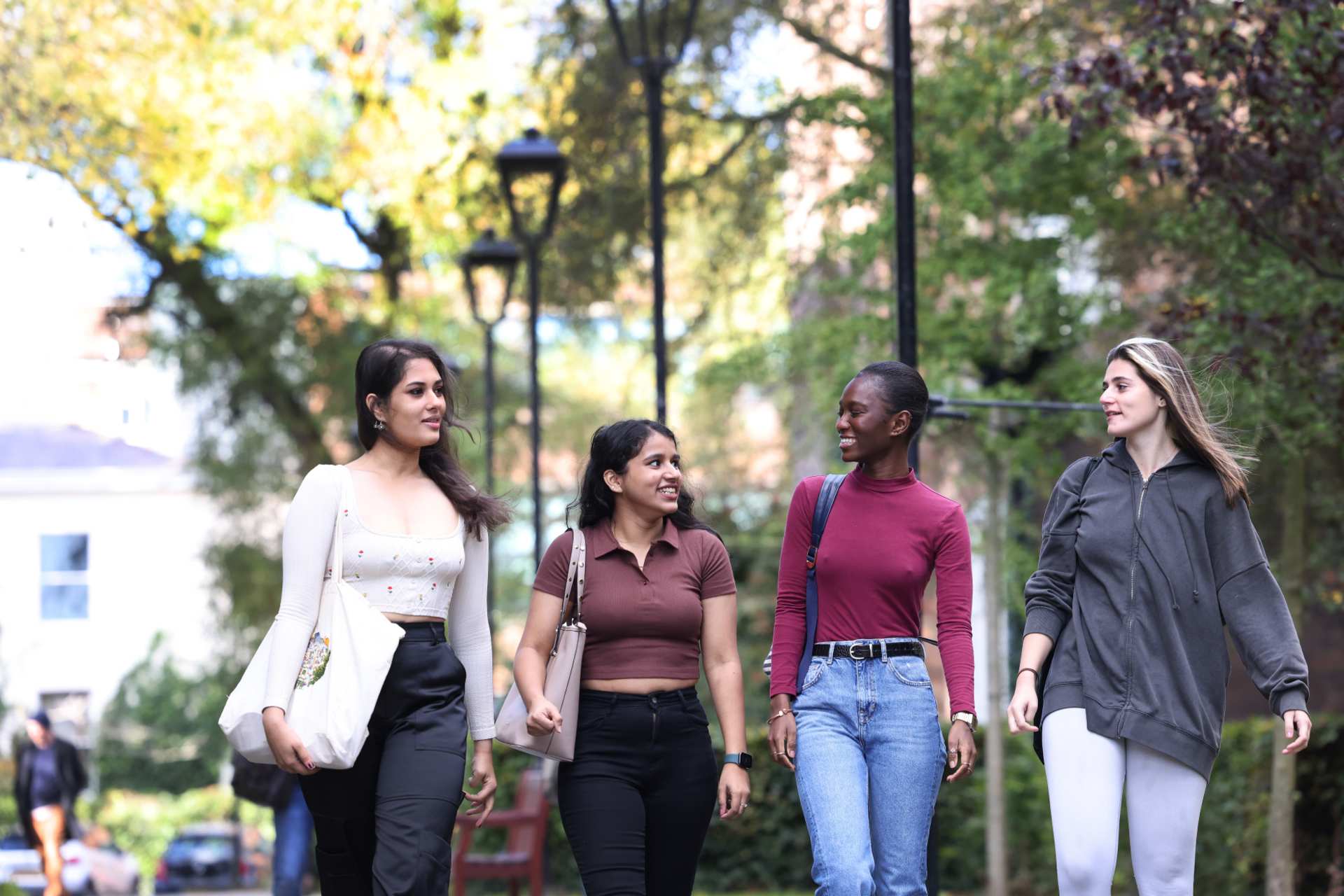 A group of students walking through campus.