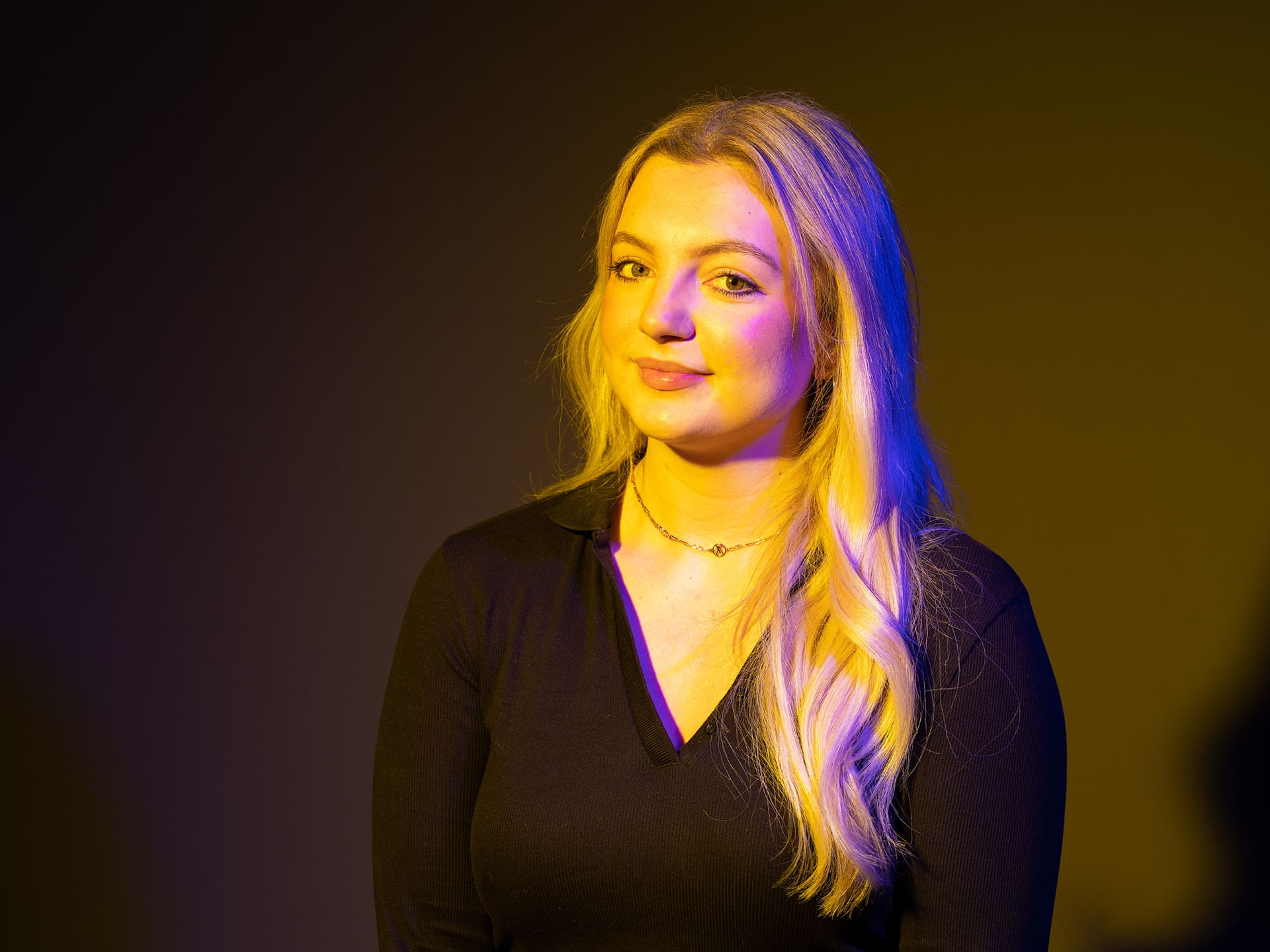Image of a female student smiling.