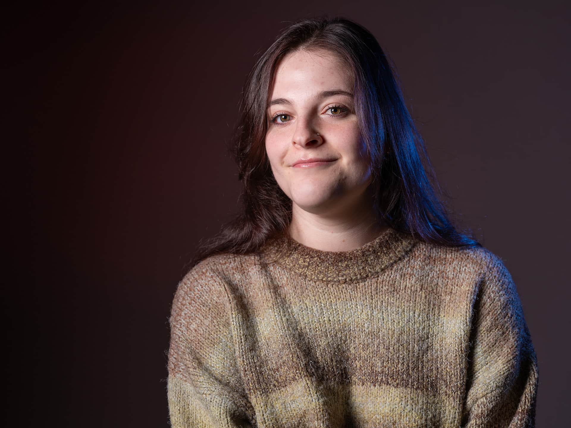 Image of a female student smiling.