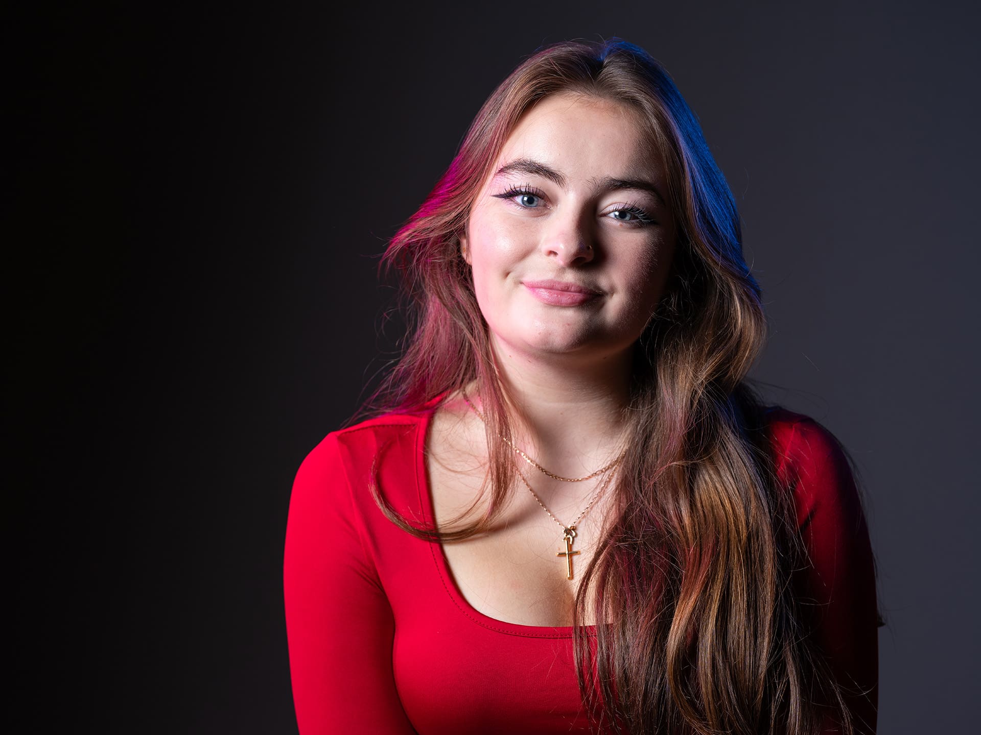 Image of a female student smiling.