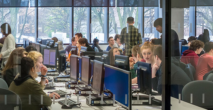 A busy computer room in the University library.