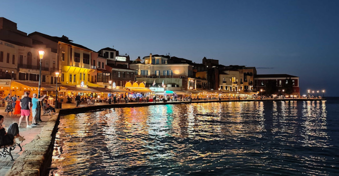 A photo of Chania harbour by night