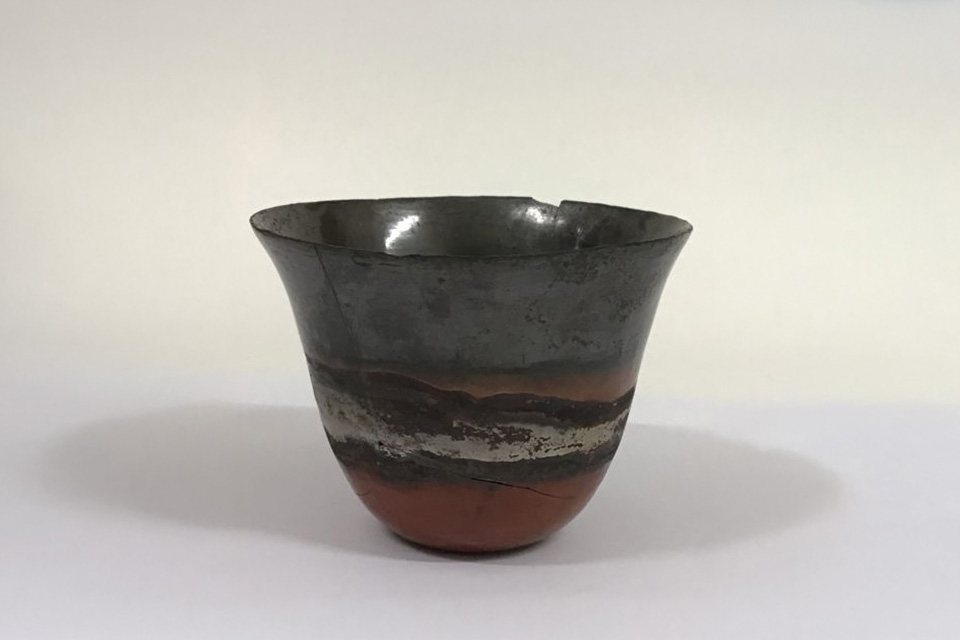 Tall pottery bowl