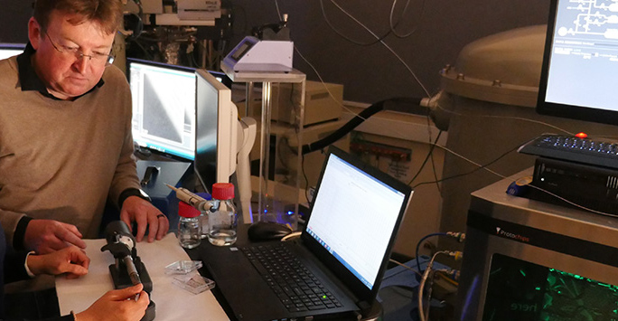 Two scientists using the facilities at the Albert Crewe Centre