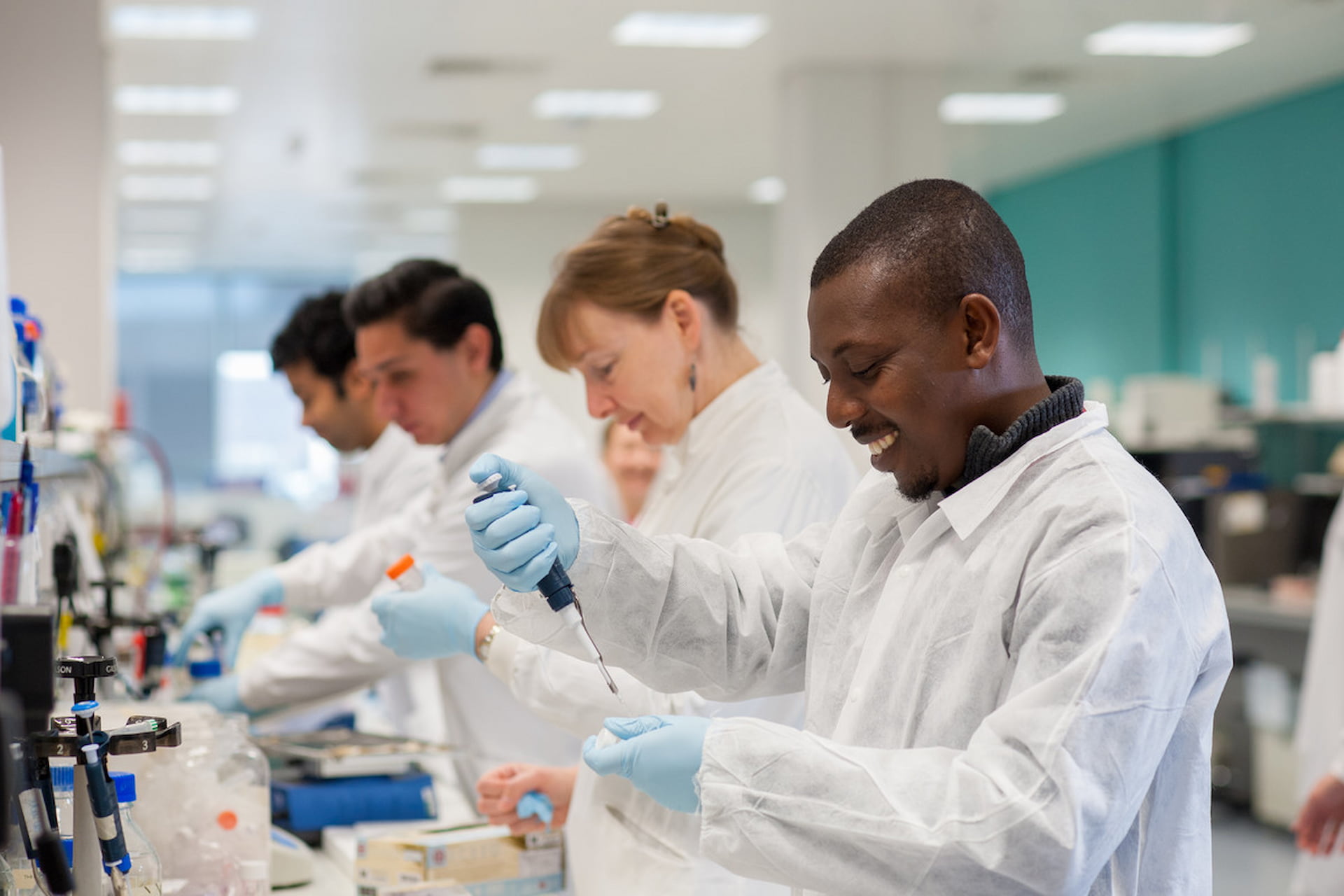 Students and staff in lab