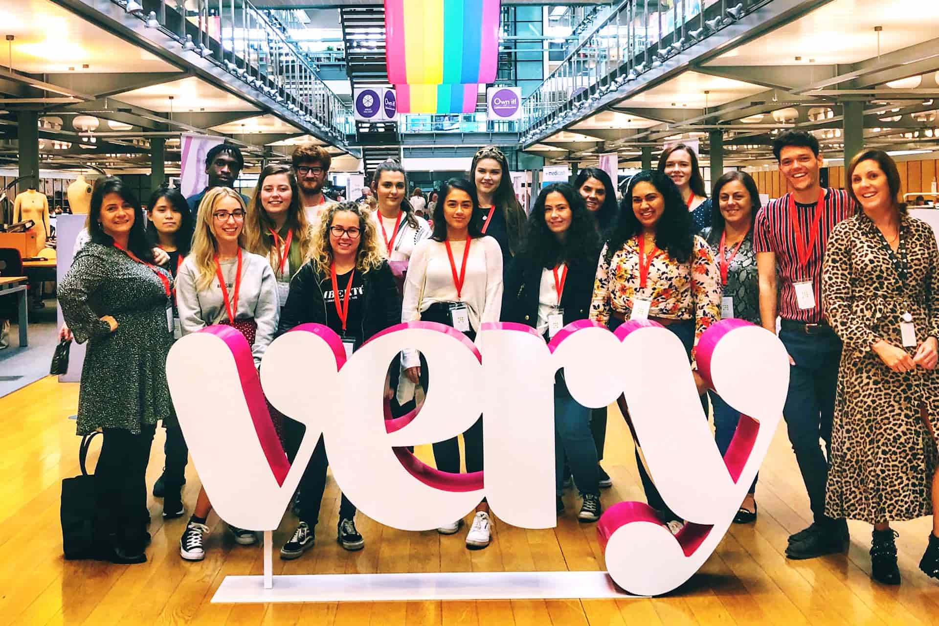 Students stood in front of VERY sign at careers fair