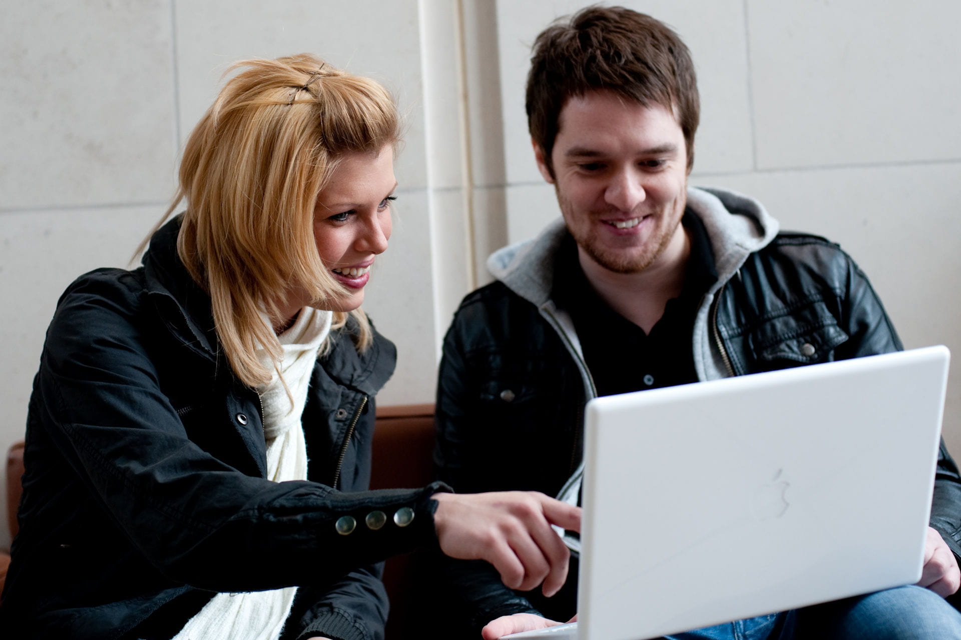 Students sitting at laptop