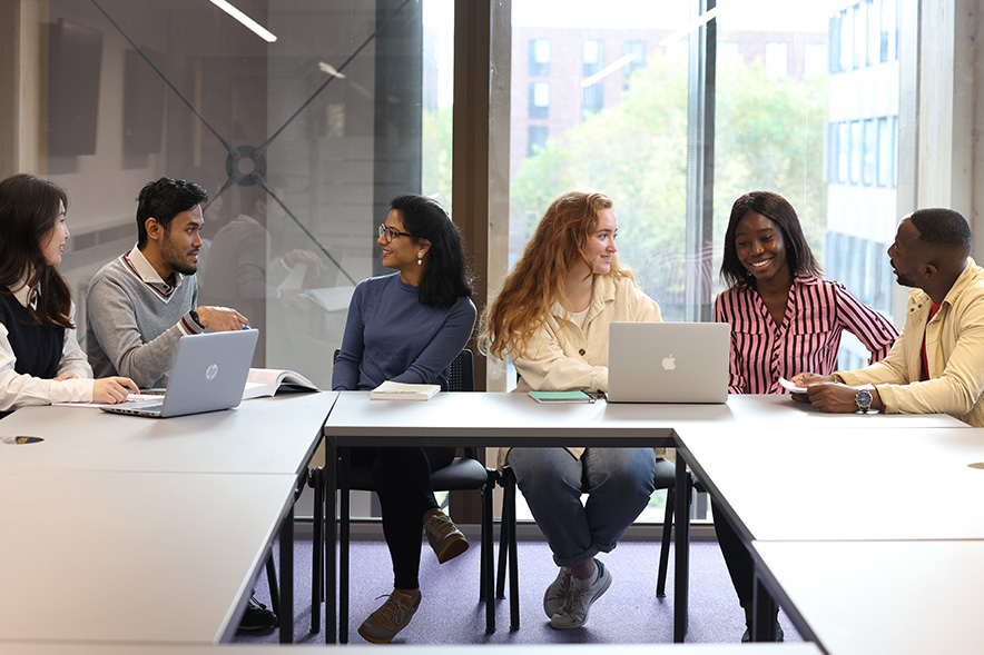 Students studying around a table