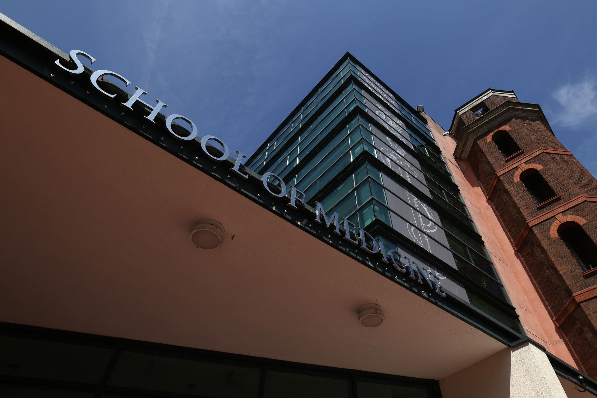 Exterior signage at the entrance of the School of medicine