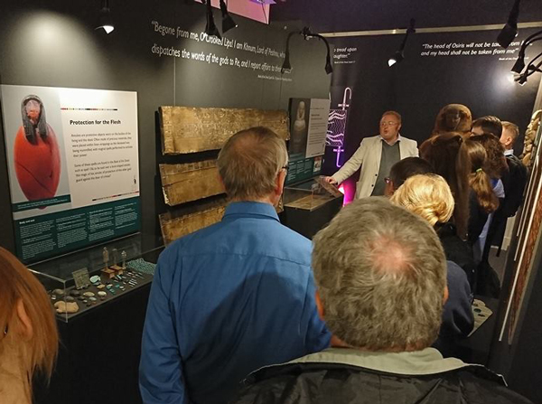 Dr Roland Enmarch takes visitors through the Underworld on LightNight, at the Book of the Dead exhibition in the Garstang Museum.