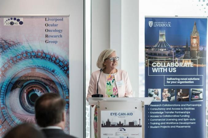Professor Sarah Coupland addresses an audience during an event