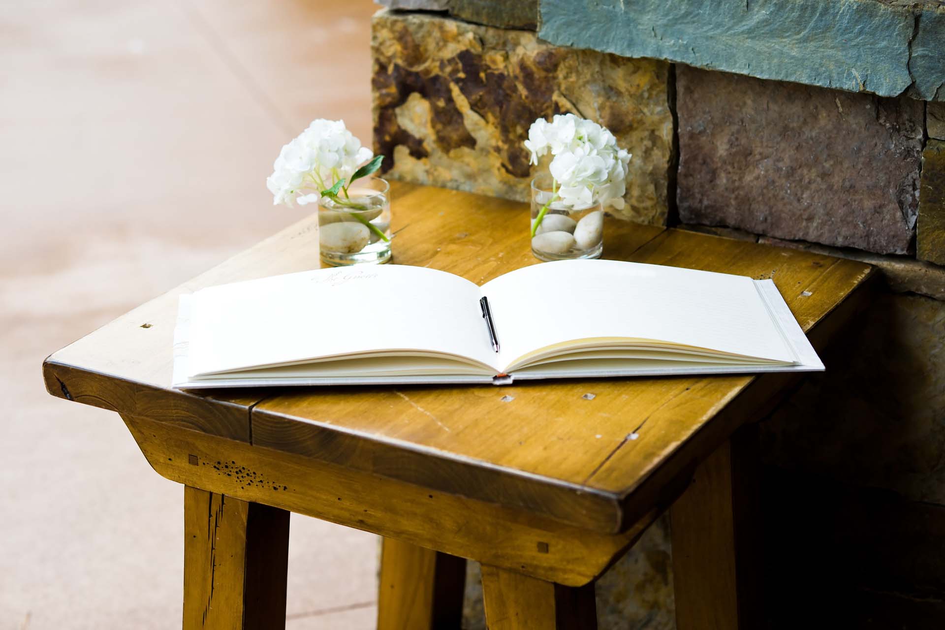Image of book on table for guests to leave messages of thanks