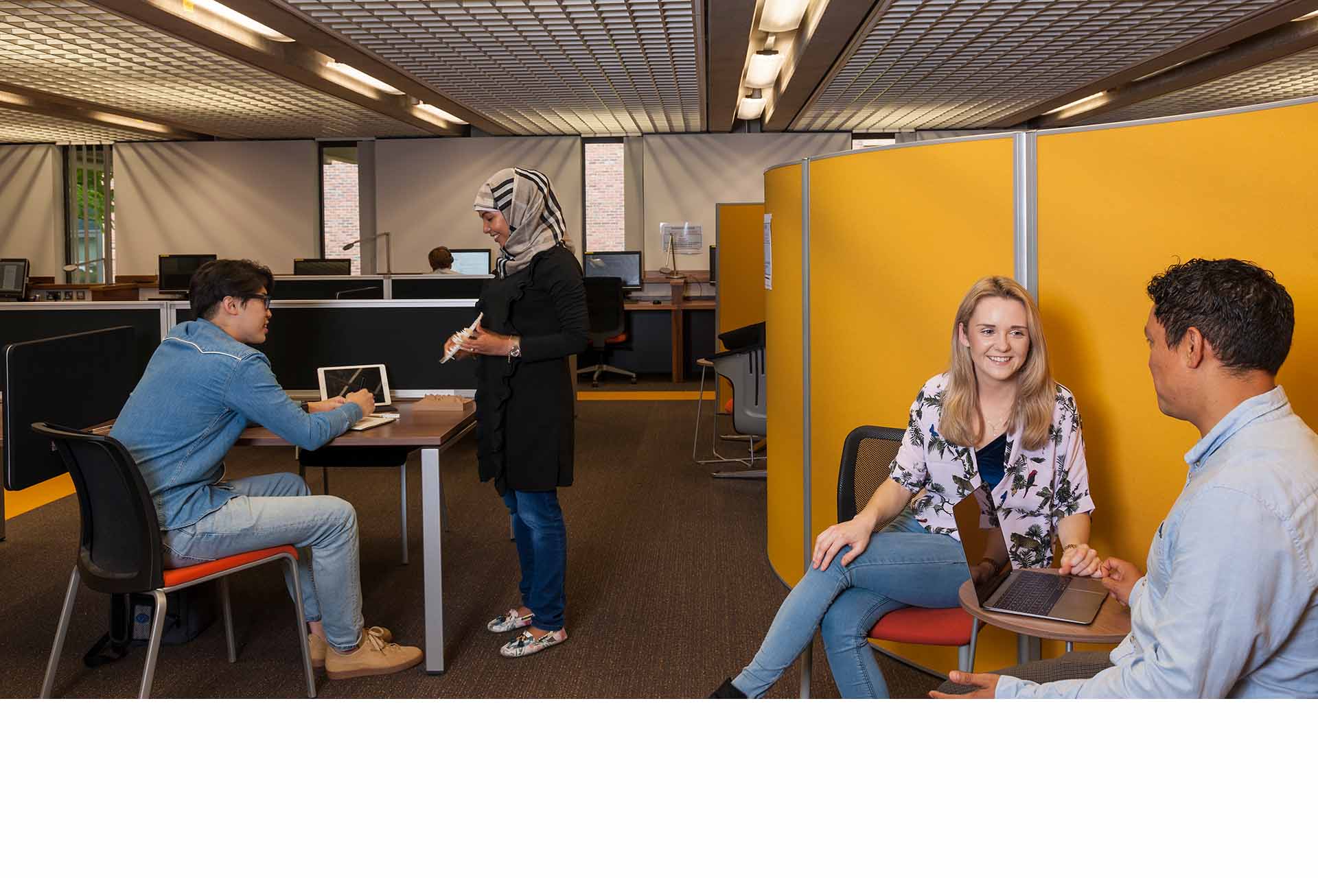 Postgraduate students in the Sydney Jones Library