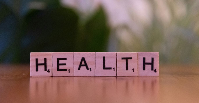 Scrabble letters spelling 'health'