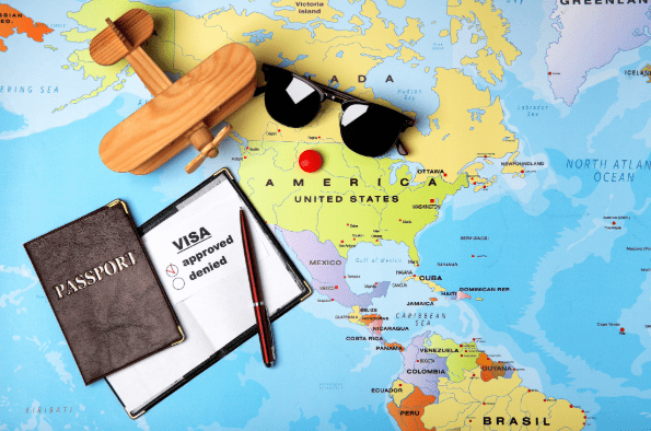 An array of study abroad motifs on a world map background