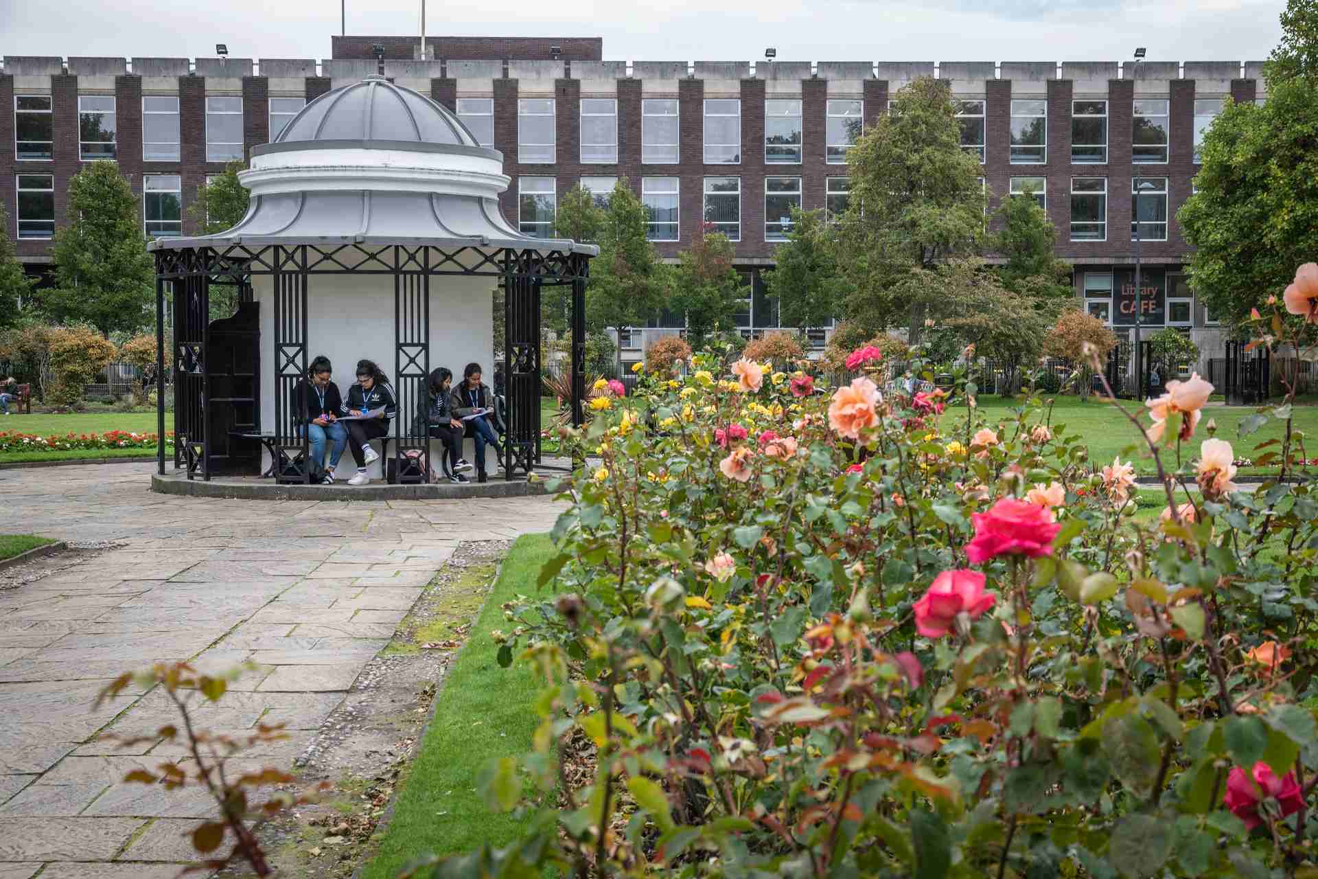 Students sitting inside the pergola in Abercromby Square