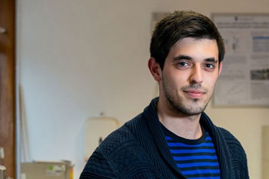 A student looking directly at the camera