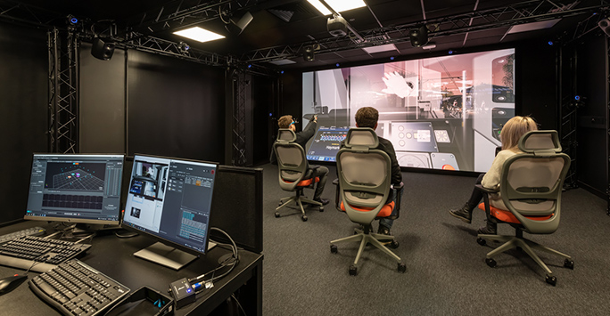 Virtual reality screens and people wearing headsets