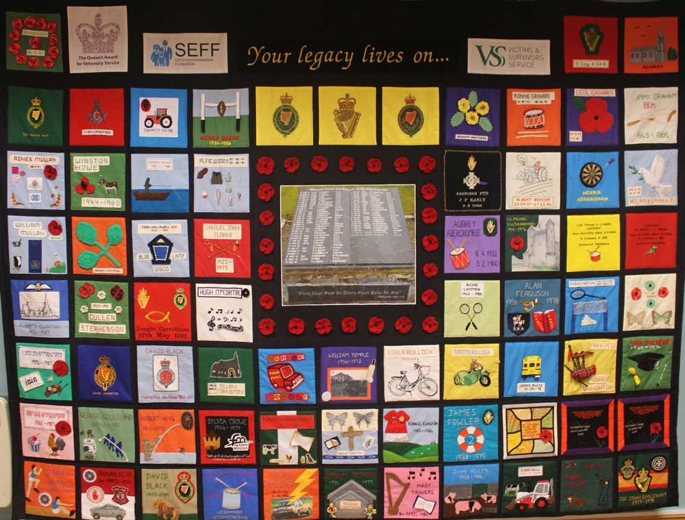 Colourful memorial quilt with patches