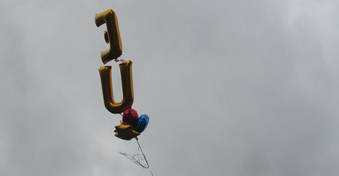 Balloons in the sky.