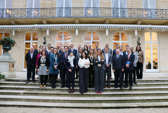 Group photo of attendees outside the British Embassy in Paris.