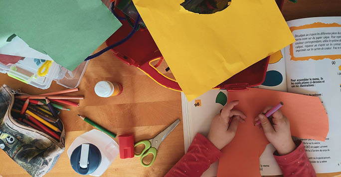 Children doing crafts.