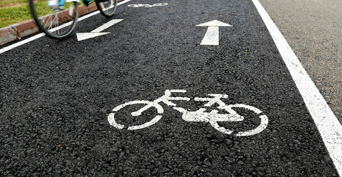 Road marking of bike on pavement.