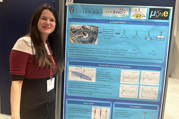 A student presenting a poster.