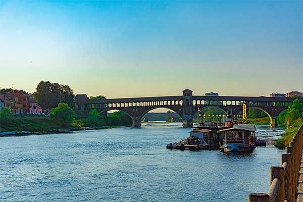 Image of a river and a bridge.